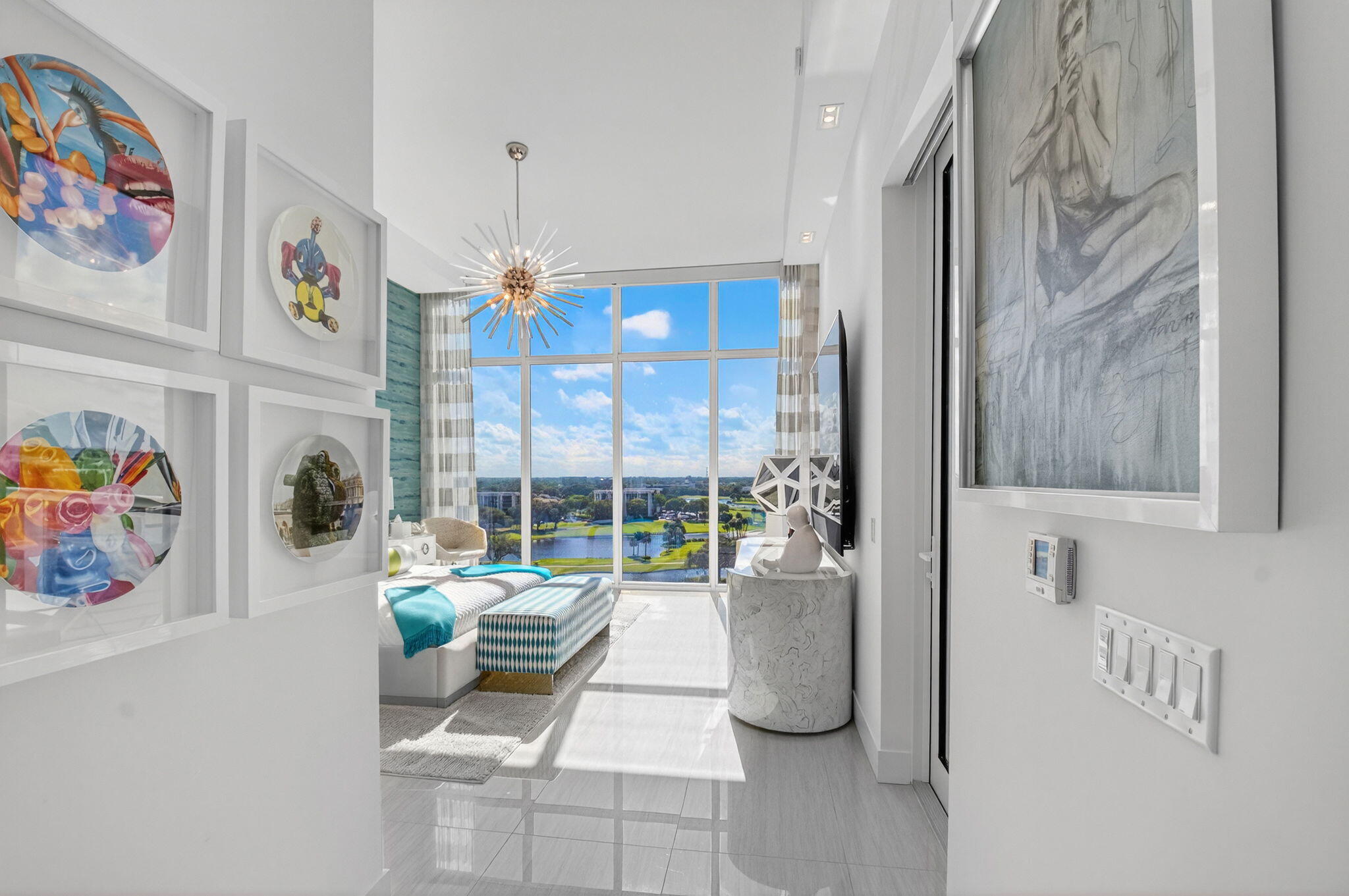 20155 Boca W Drive, Unit PHB904 Boca Raton, FL 33434 - Photo 15 of 50 a living room with fireplace furniture and a rug