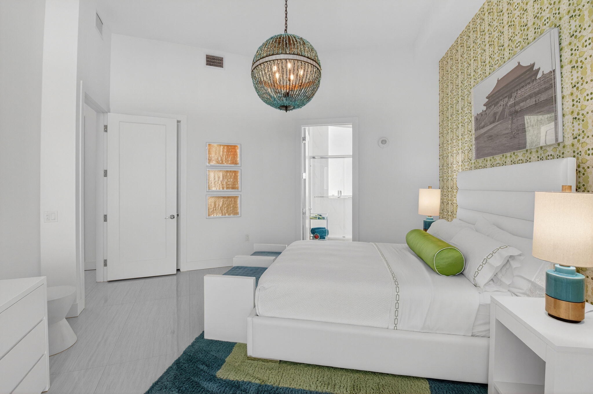 20155 Boca W Drive, Unit PHB904 Boca Raton, FL 33434 - Photo 22 of 50 a bedroom with a bed and a lamp on dresser