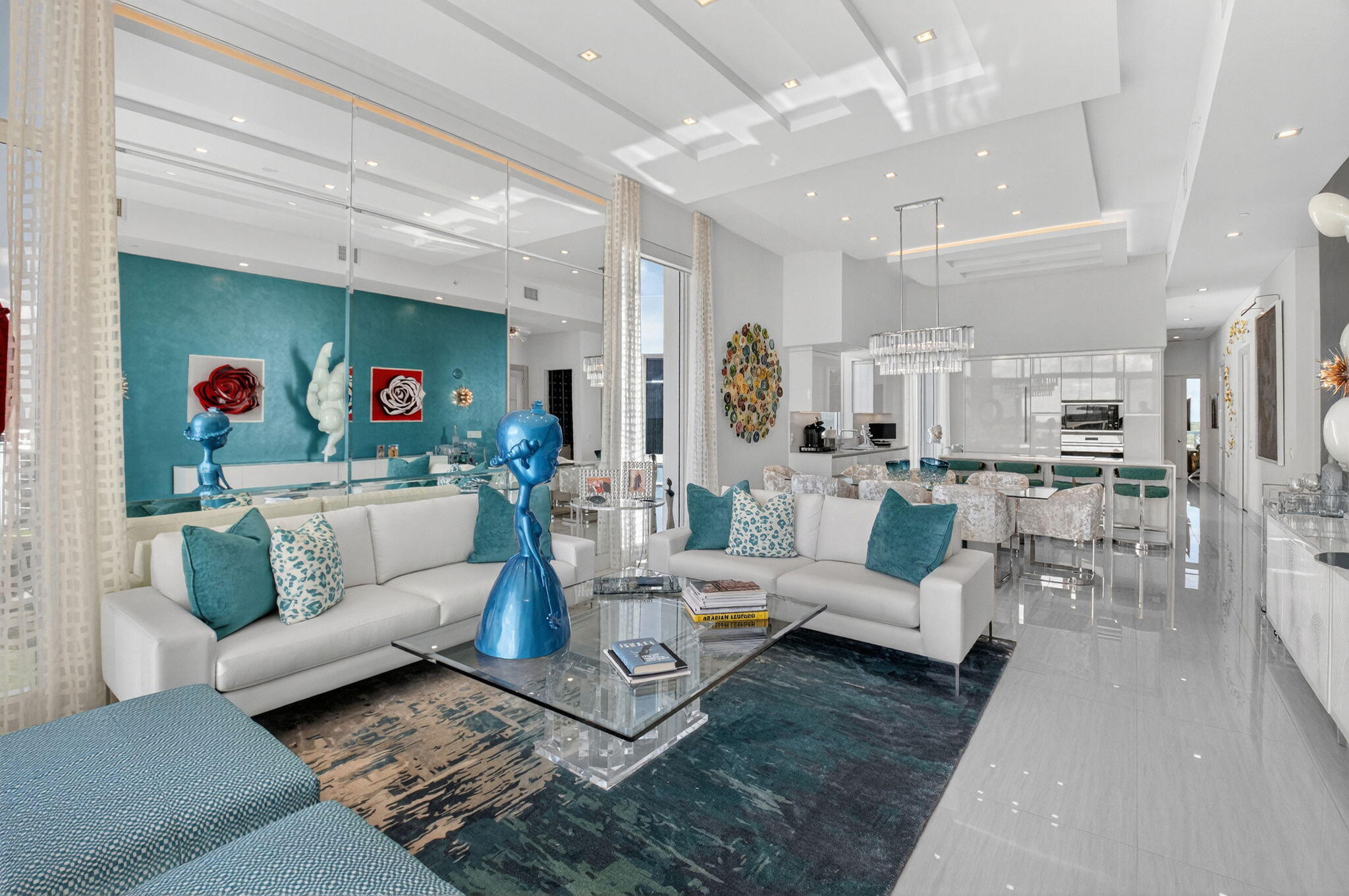 20155 Boca W Drive, Unit PHB904 Boca Raton, FL 33434 - Photo 5 of 50 a living room with furniture and a view of kitchen