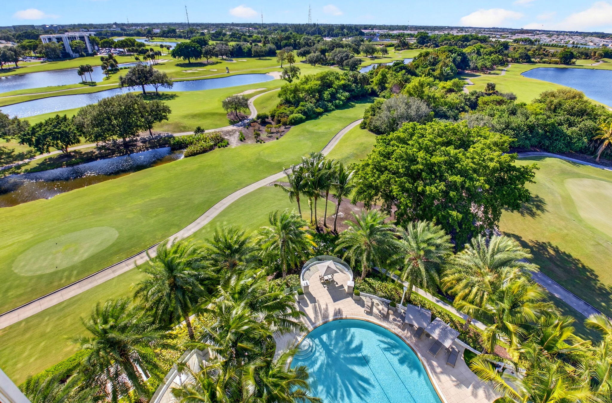 20155 Boca W Drive, Unit PHB904 Boca Raton, FL 33434 - Photo 10 of 50 a view of a lake with a house