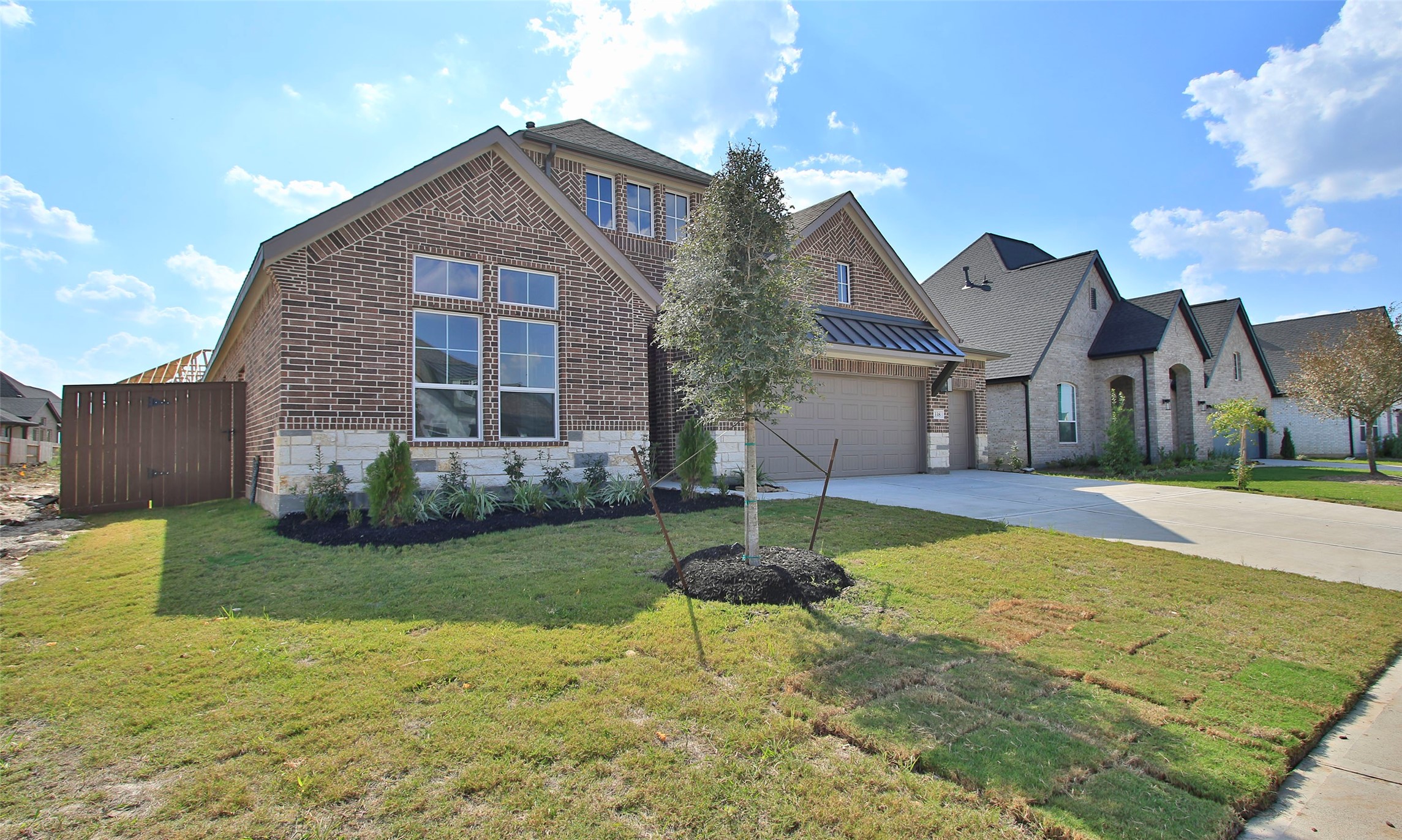 338 Blue River Trail Rosenberg, TX 77471 - Photo 2 of 36 a front view of a house with a yard