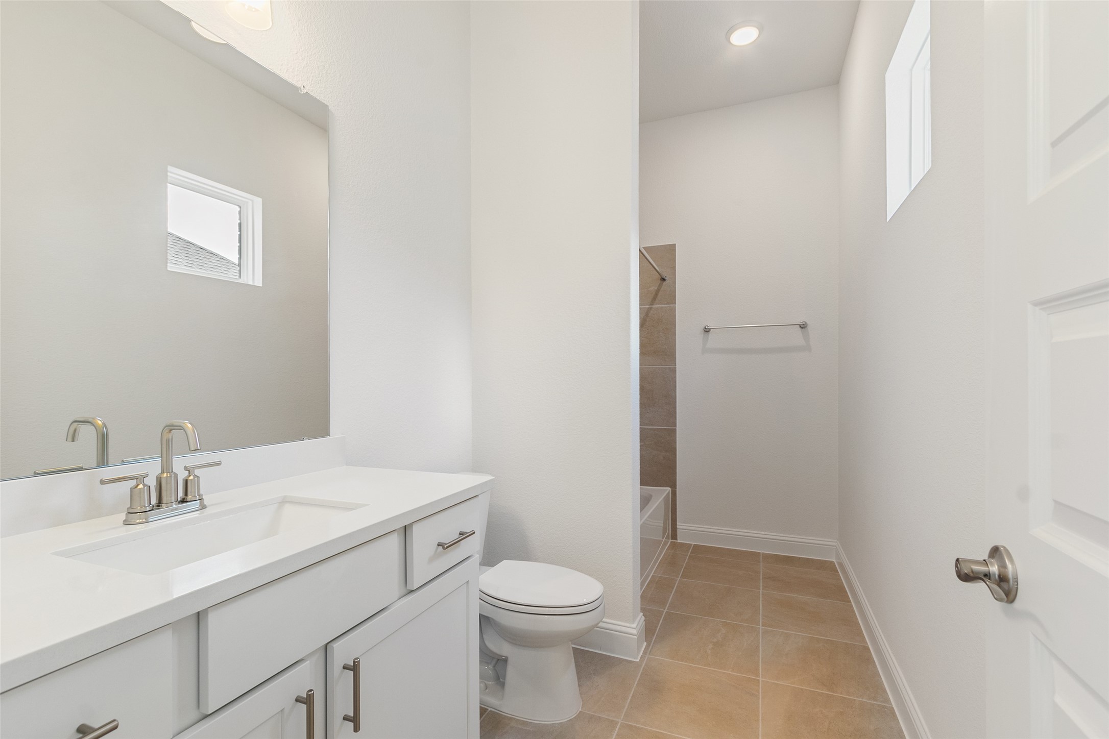 338 Blue River Trail Rosenberg, TX 77471 - Photo 23 of 36 a bathroom with a sink a toilet and vanity