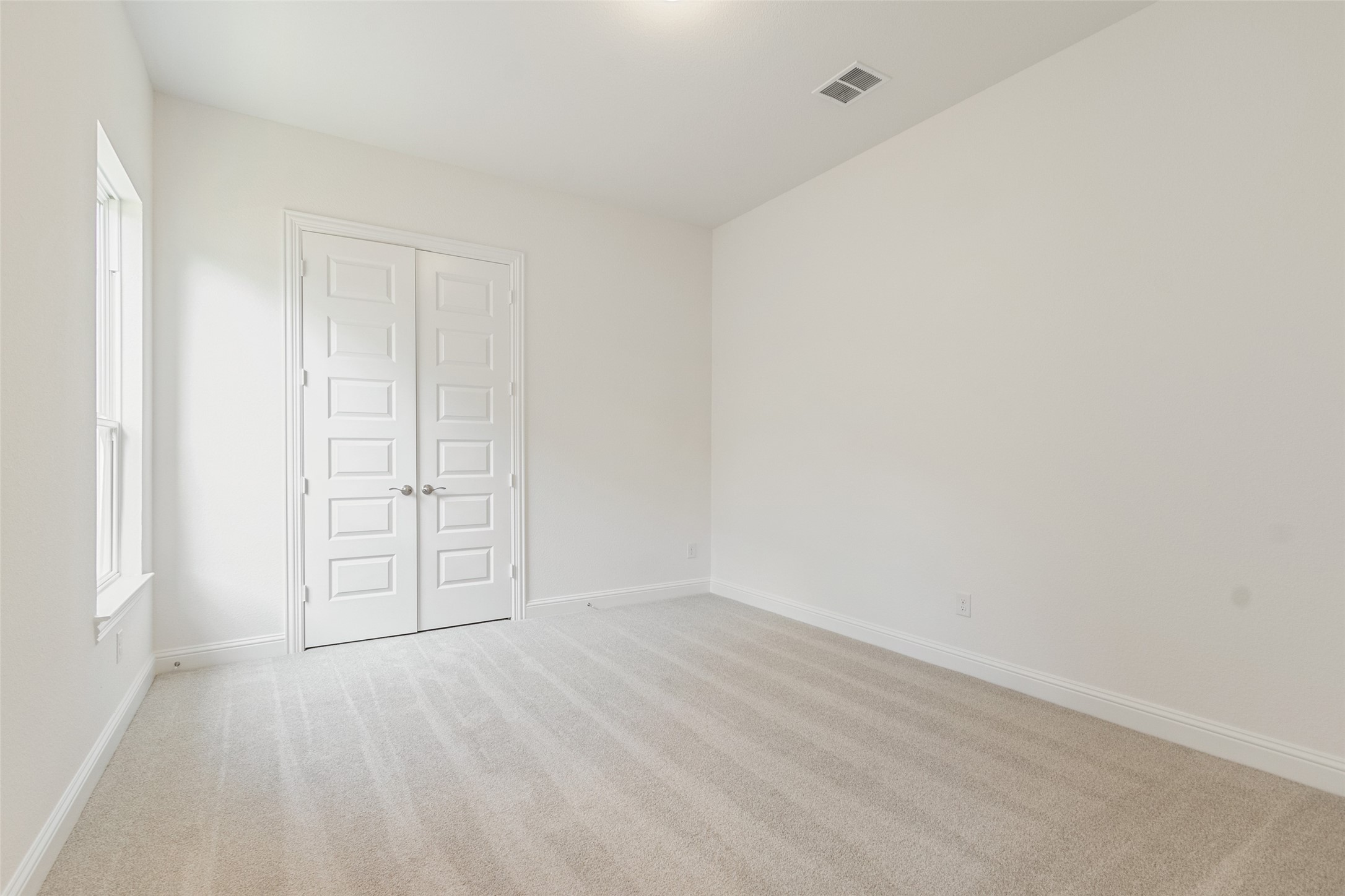 338 Blue River Trail Rosenberg, TX 77471 - Photo 24 of 36 a view of an empty room and wooden floor