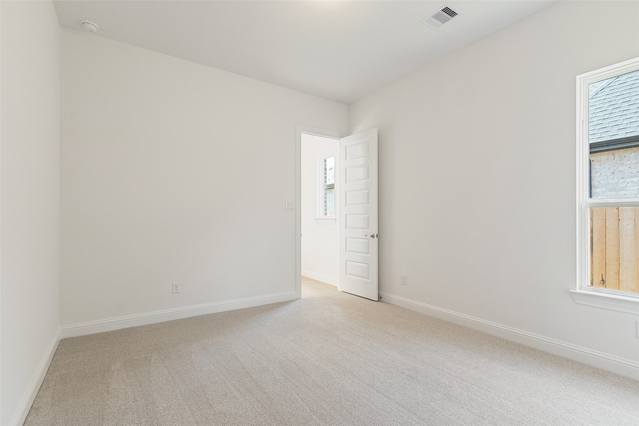 338 Blue River Trail Rosenberg, TX 77471 - Photo 25 of 36 an empty room with windows and closet