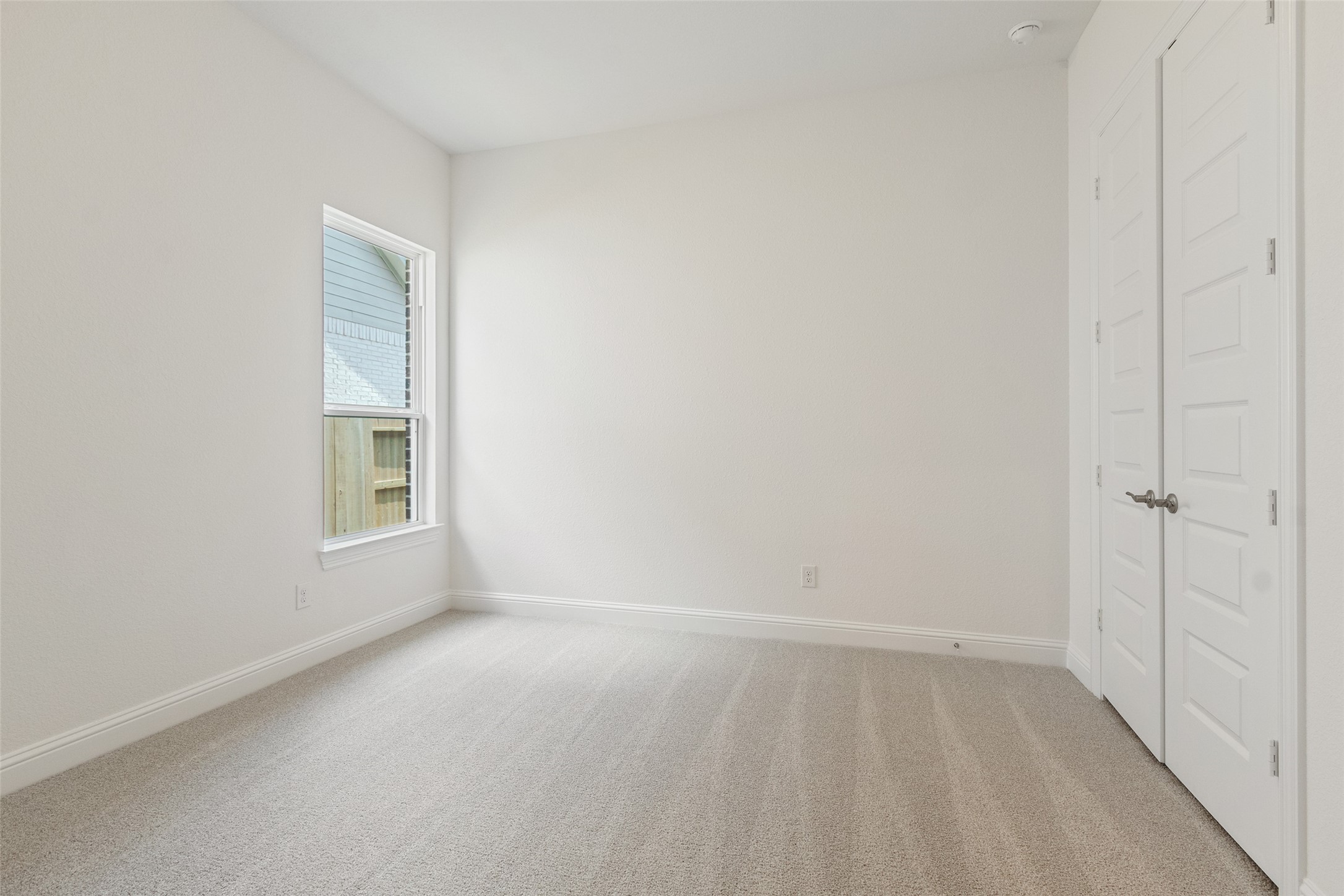 338 Blue River Trail Rosenberg, TX 77471 - Photo 26 of 36 a view of an empty room with a window