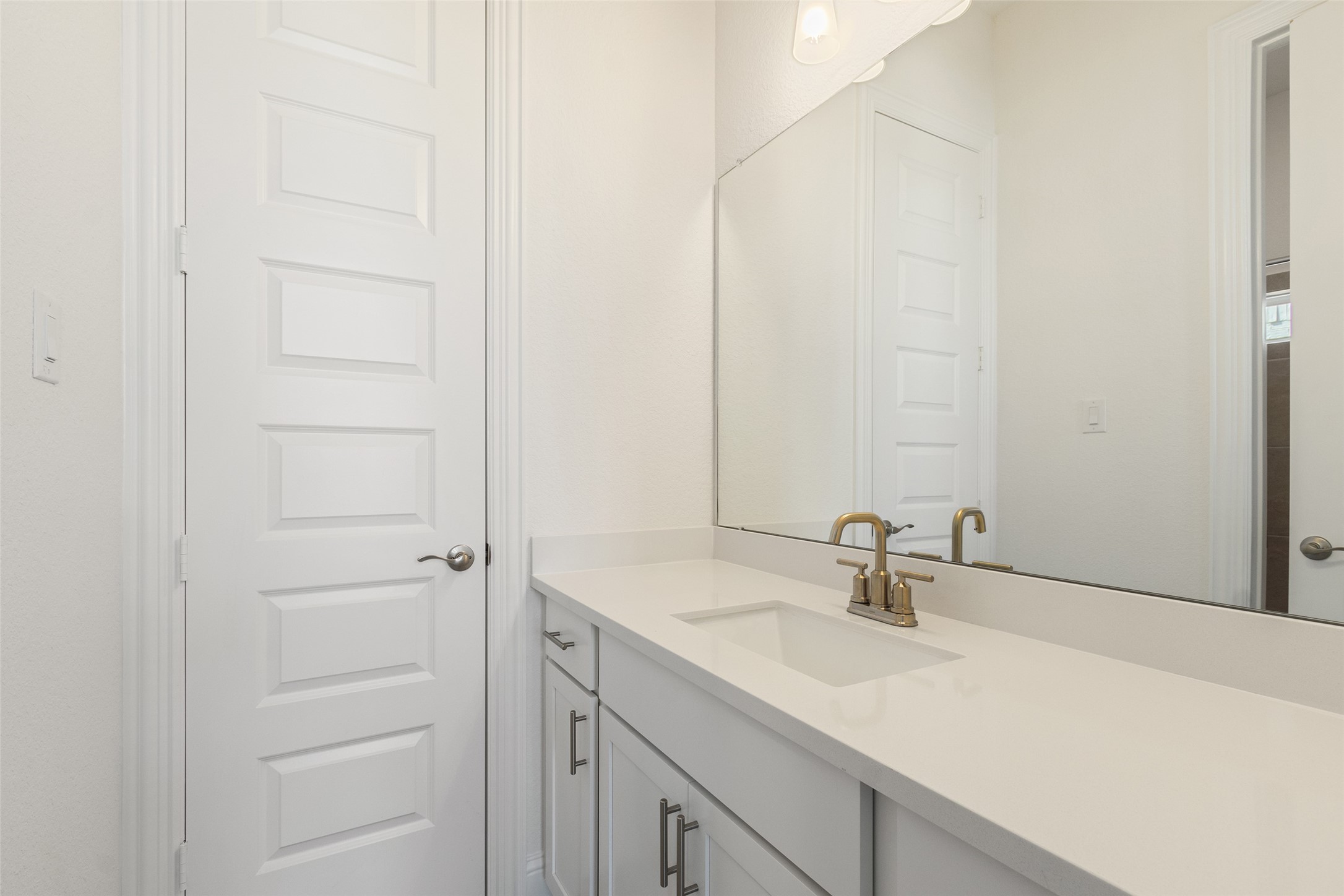 338 Blue River Trail Rosenberg, TX 77471 - Photo 30 of 36 a bathroom with a sink and a mirror