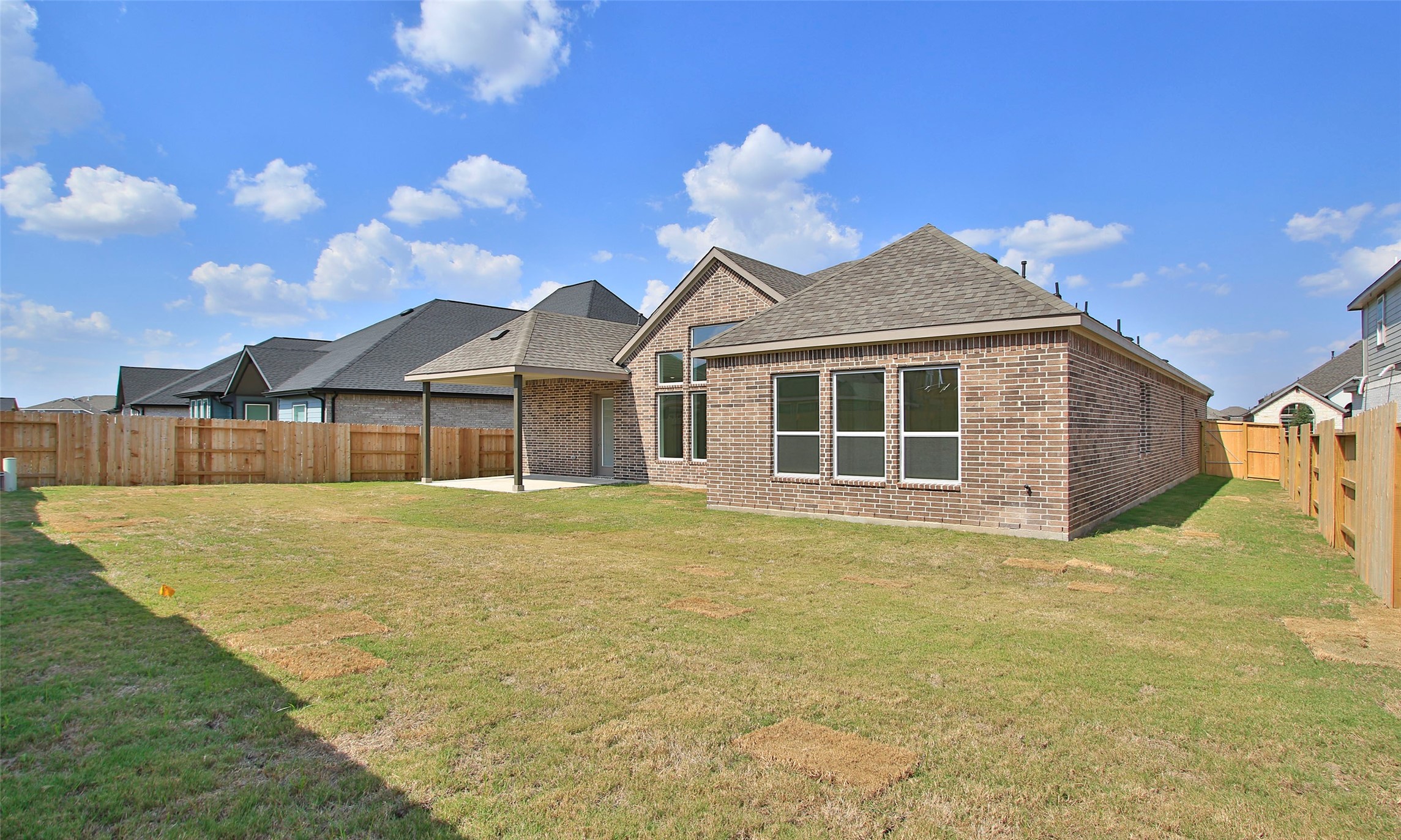 338 Blue River Trail Rosenberg, TX 77471 - Photo 35 of 36 a front view of a house with a big yard