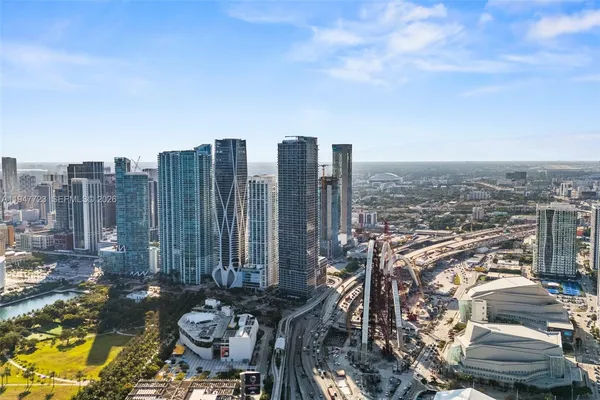 a view of a city with tall buildings