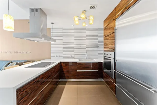 a kitchen with a sink and a window