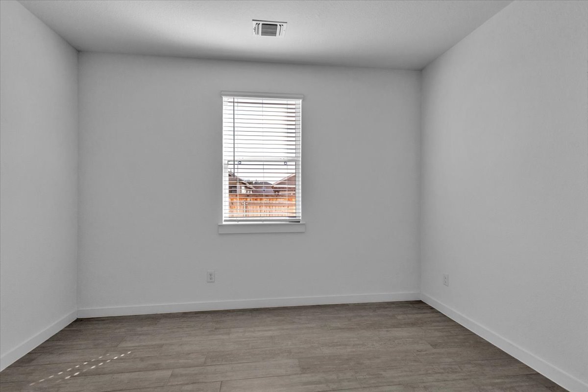 12620 Penguin Path Manor Manor, TX 78653 - Photo 22 of 37 Unfurnished room featuring light wood-type flooring