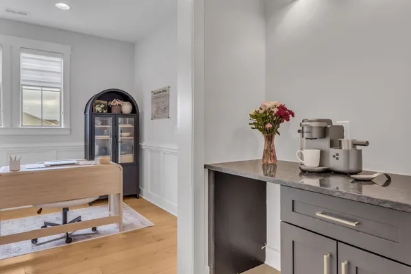 a utility room with sink dryer and washer