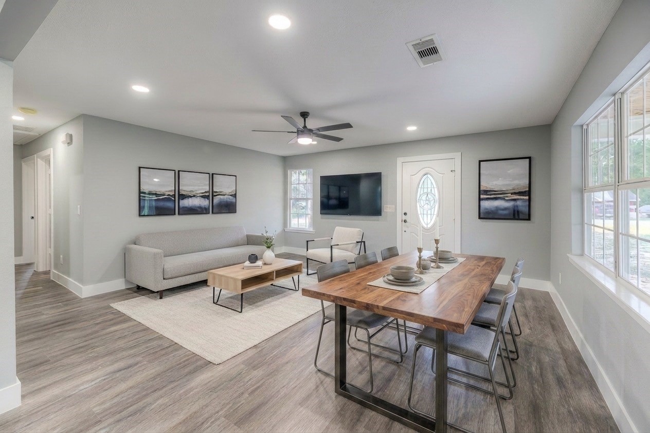 388 Sunrise Wood Road Goodrich, TX 77335 - Photo 1 of 33 a living room with furniture and a flat screen tv