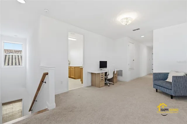 a view of livingroom with furniture and closet