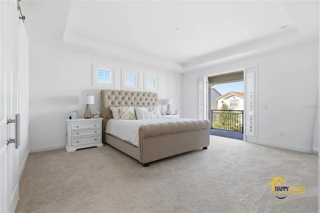 a bedroom with a bed and a cabinets