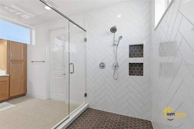 a bathroom with a double vanity sink and a mirror