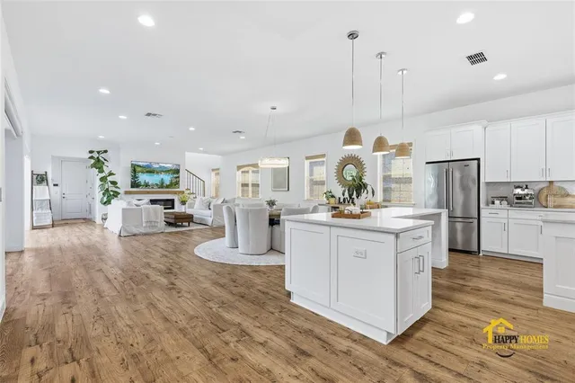 a dining room with a table and chairs