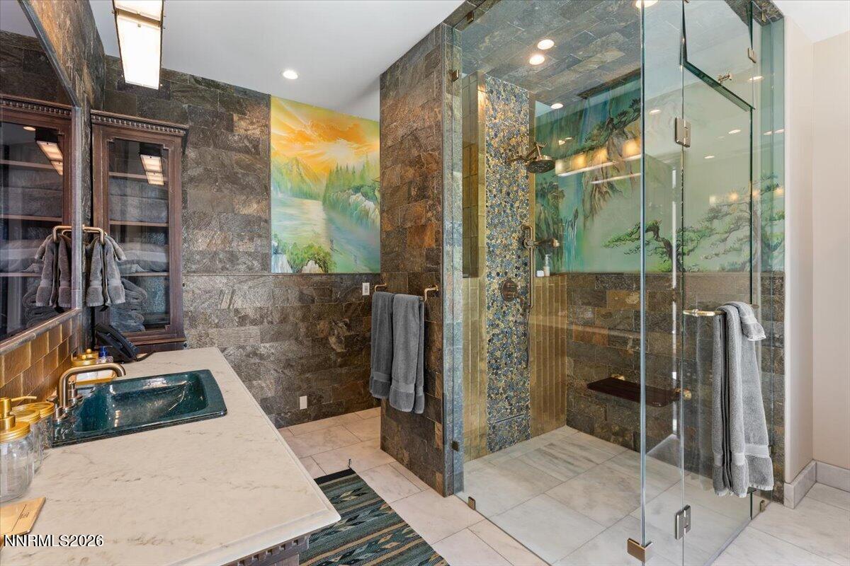 969 Fairview Boulevard Incline Village, NV 89451 - Photo 18 of 40 a bathroom with a glass shower door