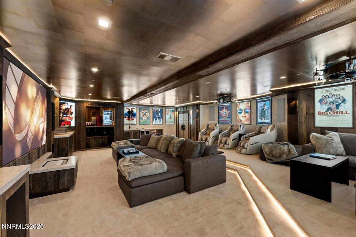 969 Fairview Boulevard Incline Village, NV 89451 - Photo 22 of 40 a living room with furniture and a flat screen tv