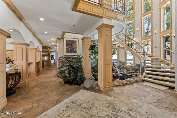 a living room with large windows