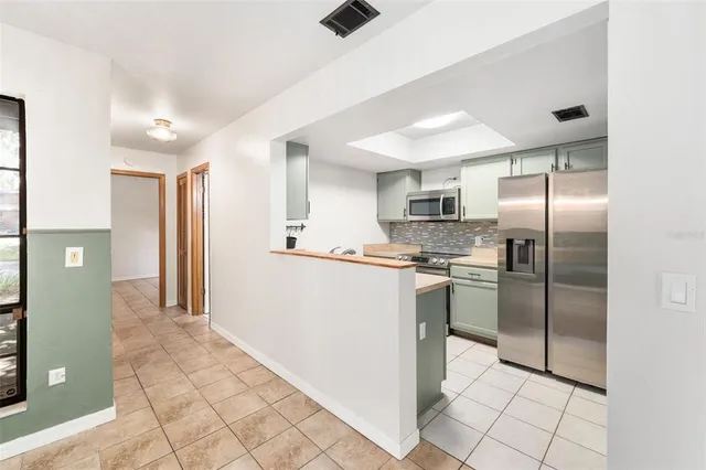 a view of a big room with carpet