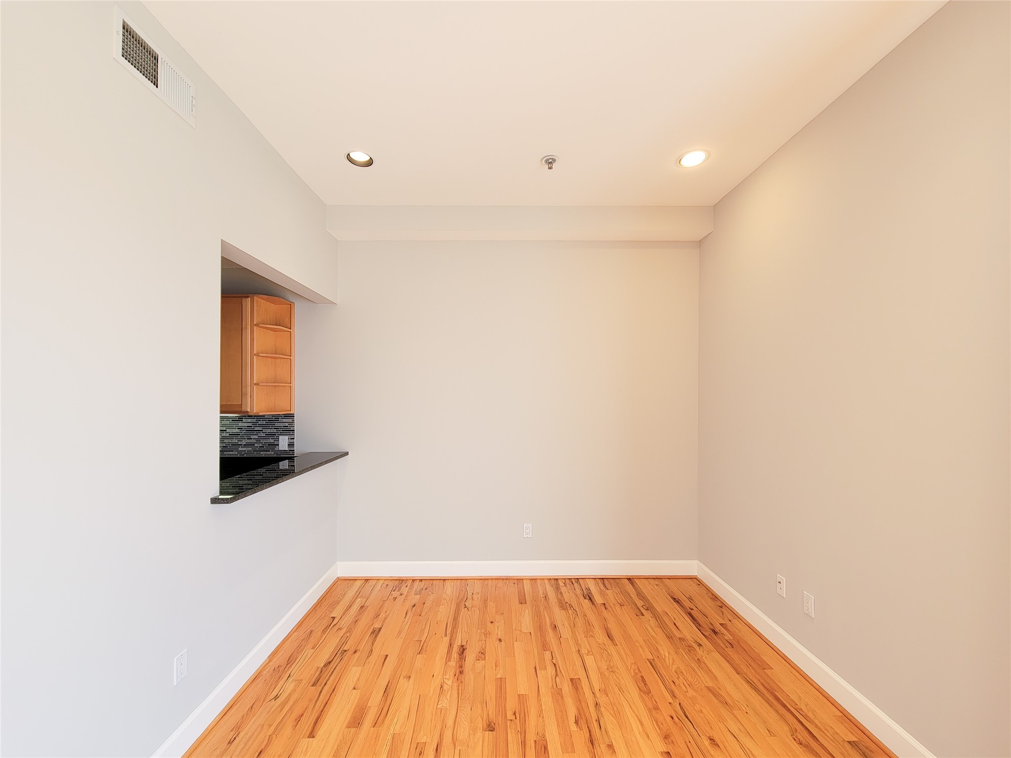 2520 Robinhood Street, Unit 800 Houston, TX 77005 - Photo 16 of 46 a view of empty room with wooden floor and fan