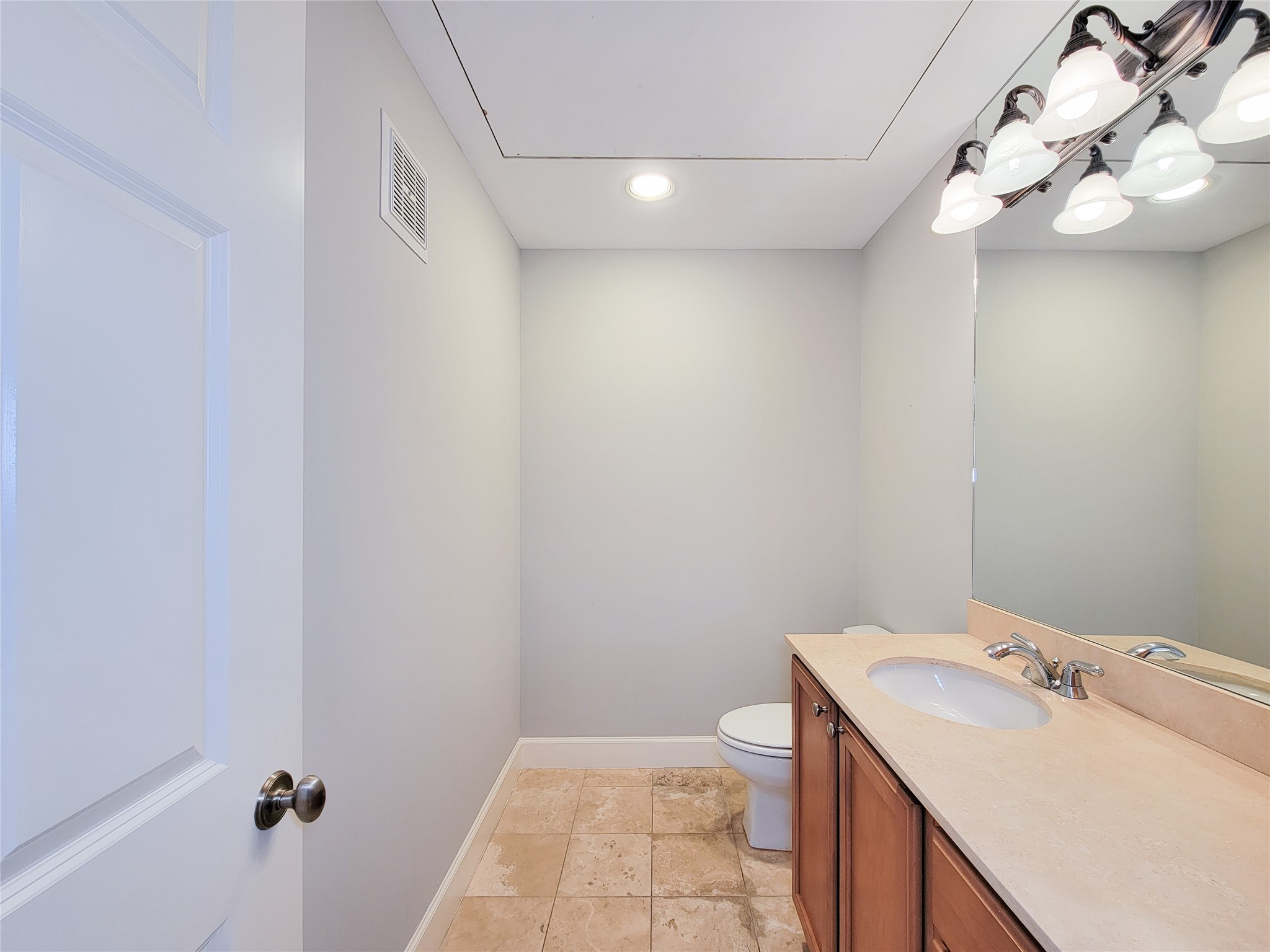2520 Robinhood Street, Unit 800 Houston, TX 77005 - Photo 22 of 46 a bathroom with a sink a toilet and vanity