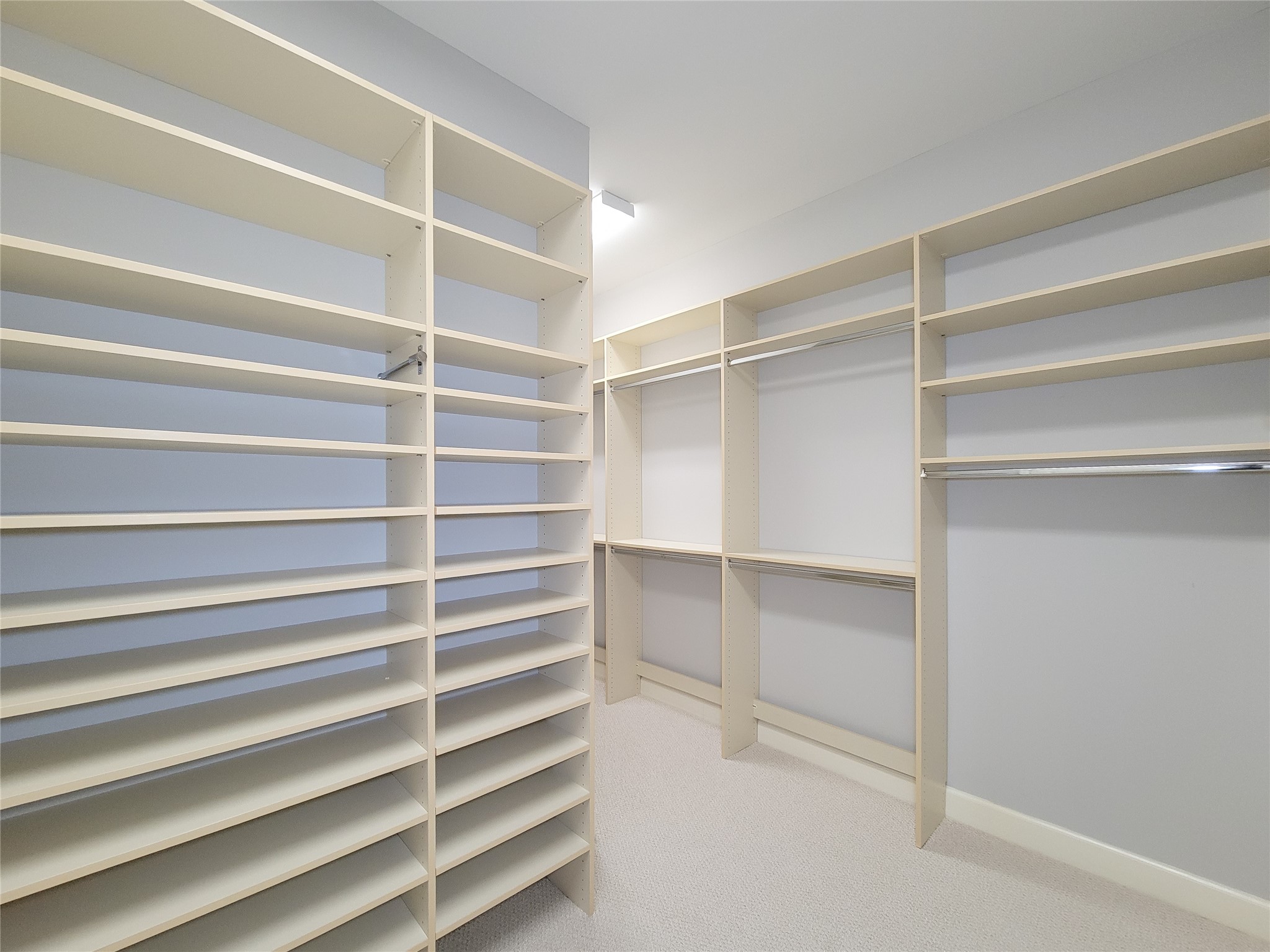 2520 Robinhood Street, Unit 800 Houston, TX 77005 - Photo 34 of 46 a view of walk in closet with empty racks
