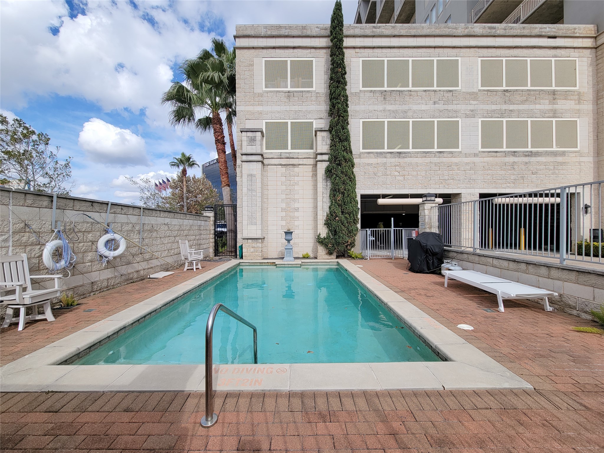 2520 Robinhood Street, Unit 800 Houston, TX 77005 - Photo 44 of 46 a view of a balcony with floor to ceiling windows with wooden floor
