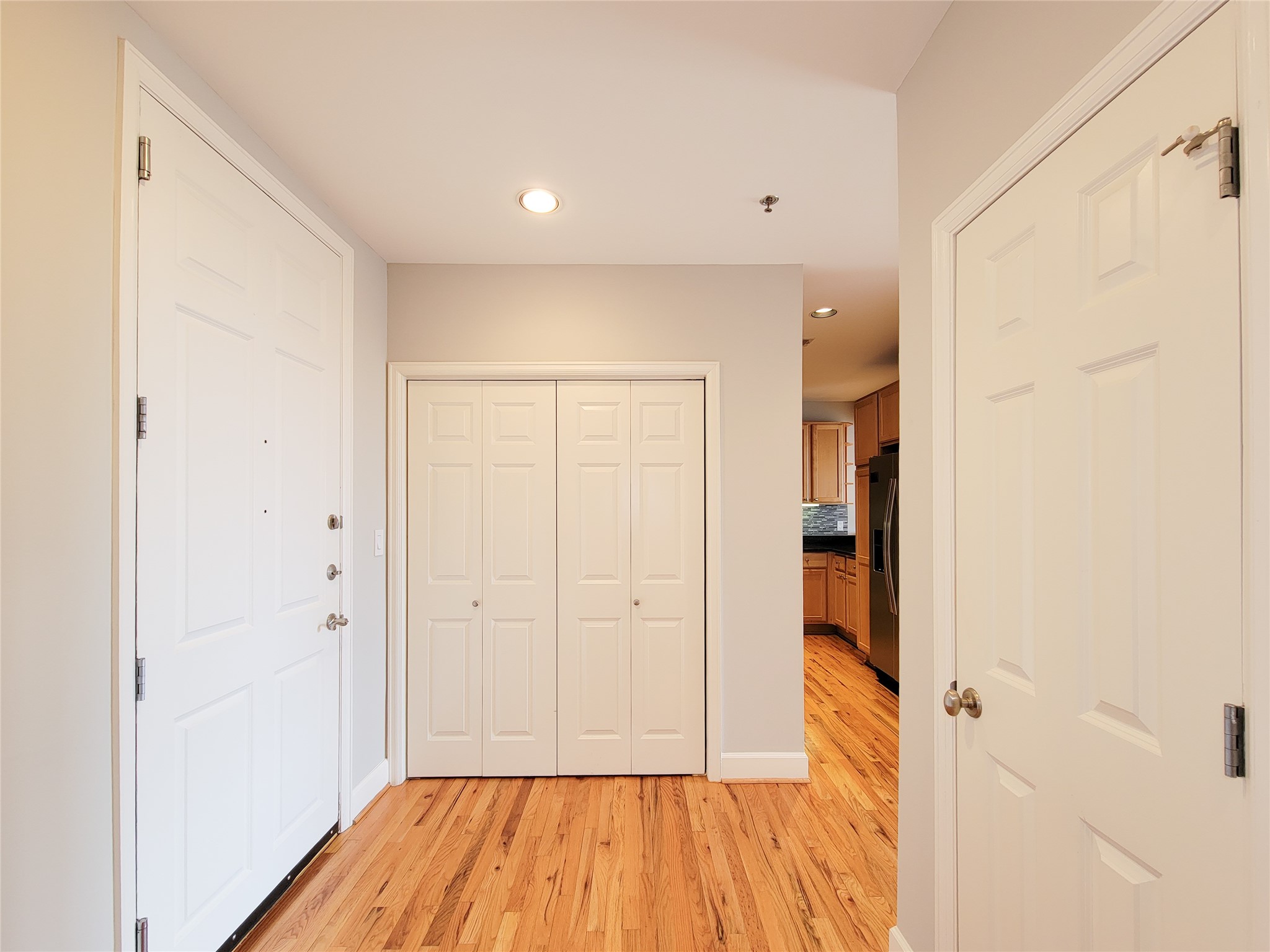 2520 Robinhood Street, Unit 800 Houston, TX 77005 - Photo 8 of 46 a view of a hallway with wooden floor