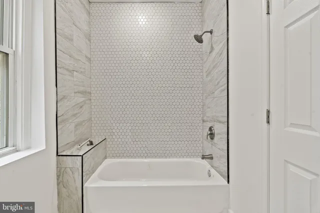 a bathroom with a bathtub