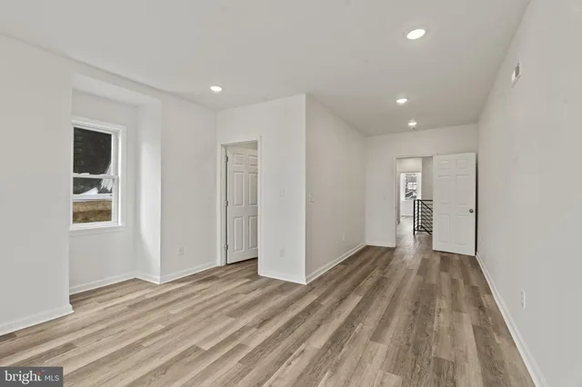 a view of entryway with wooden floor