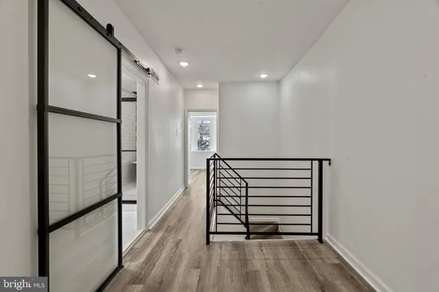 a view of livingroom with furniture and wooden floor