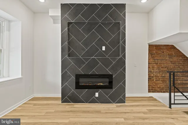 a view of entryway with wooden floor