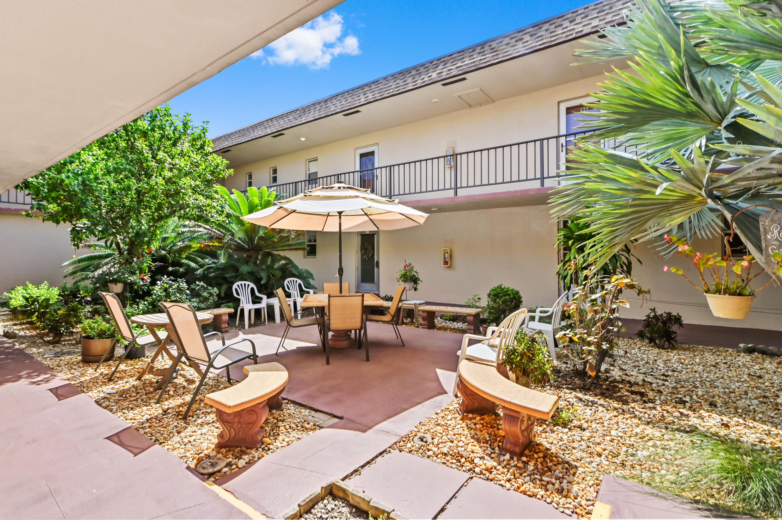 504 Davis Road, Unit 97 Palm Springs, FL 33461 - Photo 23 of 34 02 courtyard 01