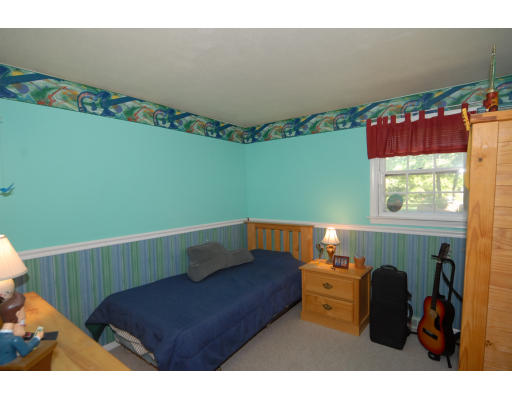 12 Tamarack Road Natick, MA 01760 - Photo 14 of 26 a living room with furniture and a window