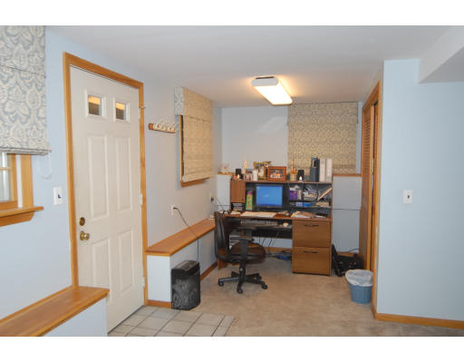 12 Tamarack Road Natick, MA 01760 - Photo 18 of 26 a living room with furniture and a piano