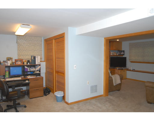 12 Tamarack Road Natick, MA 01760 - Photo 19 of 26 a living room with furniture and a wooden floor