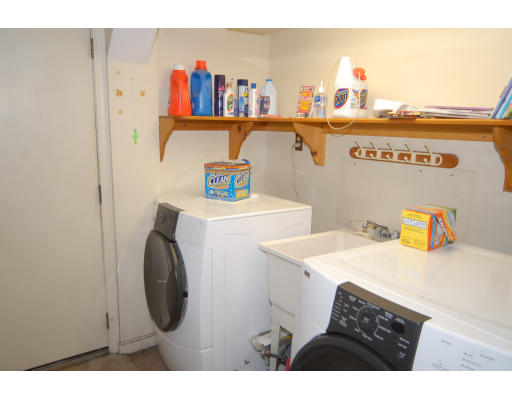 12 Tamarack Road Natick, MA 01760 - Photo 21 of 26 a utility room with dryer and washer