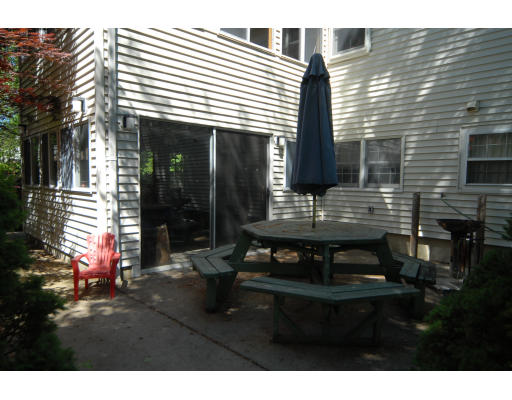 12 Tamarack Road Natick, MA 01760 - Photo 24 of 26 a front view of a house with a garden