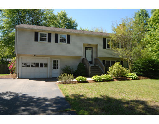 12 Tamarack Road Natick, MA 01760 - Photo 26 of 26 a front view of a house with a yard