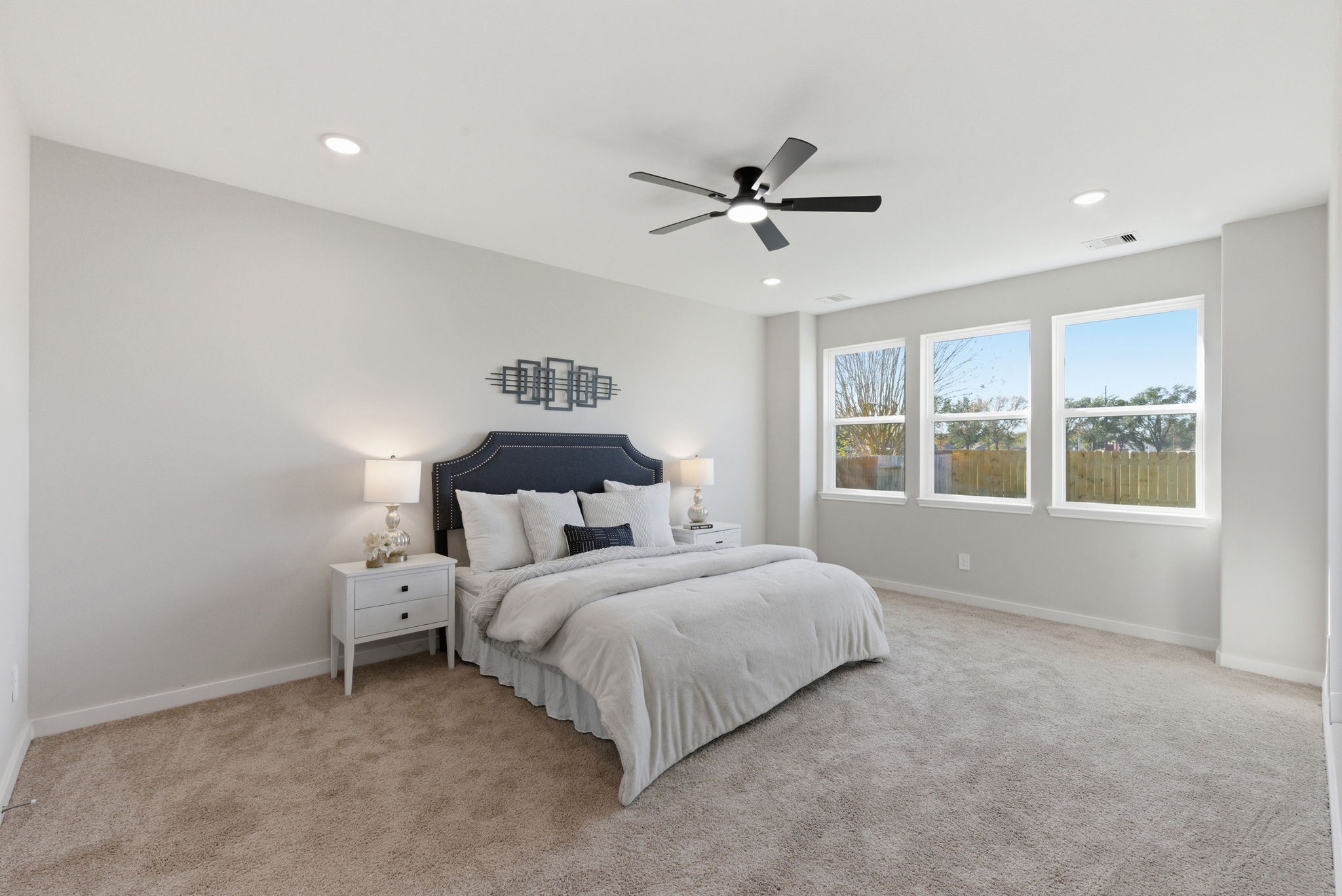 2443 Inlet Court Fresno, TX 77545 - Photo 21 of 50 a bedroom with a bed and a window