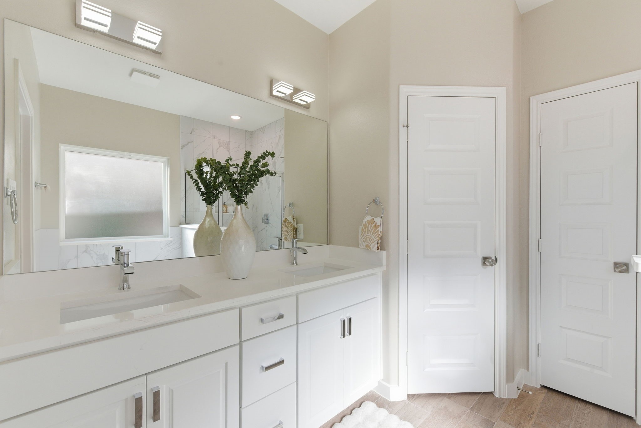 2443 Inlet Court Fresno, TX 77545 - Photo 25 of 50 a bathroom with a sink double vanity granite and a mirror
