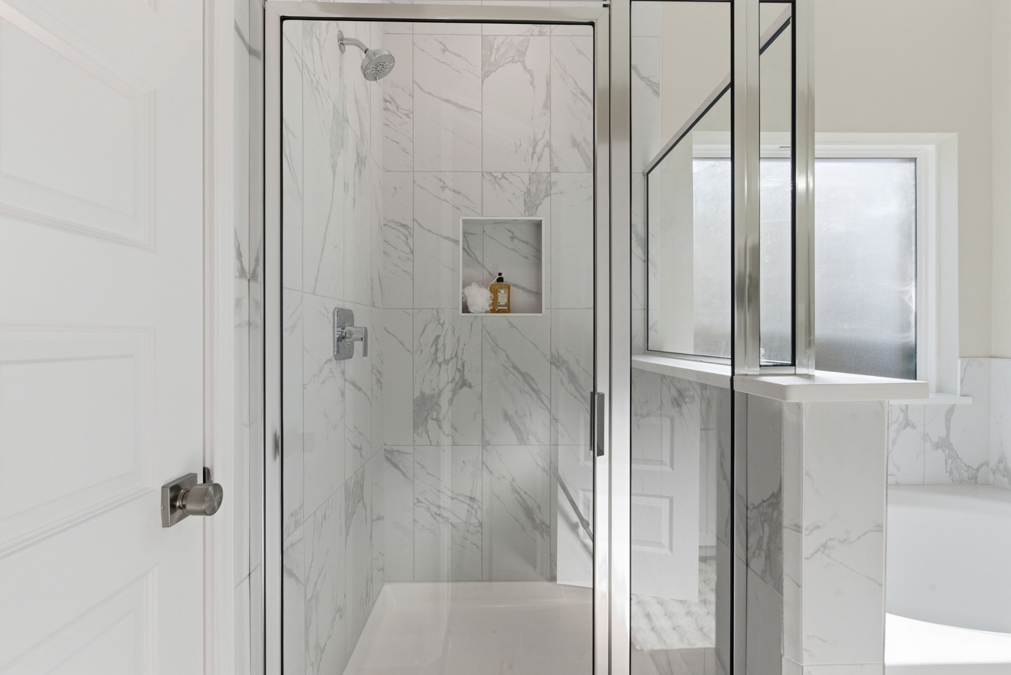 2443 Inlet Court Fresno, TX 77545 - Photo 28 of 50 a bathroom with a glass shower door