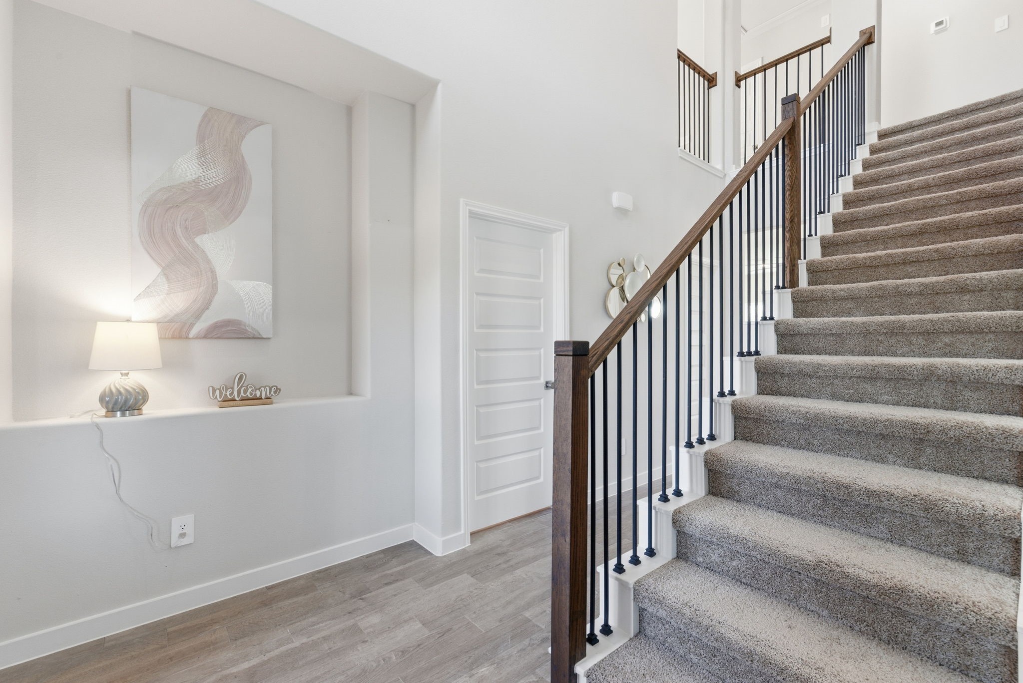2443 Inlet Court Fresno, TX 77545 - Photo 32 of 50 a view of entryway and hall with wooden floor