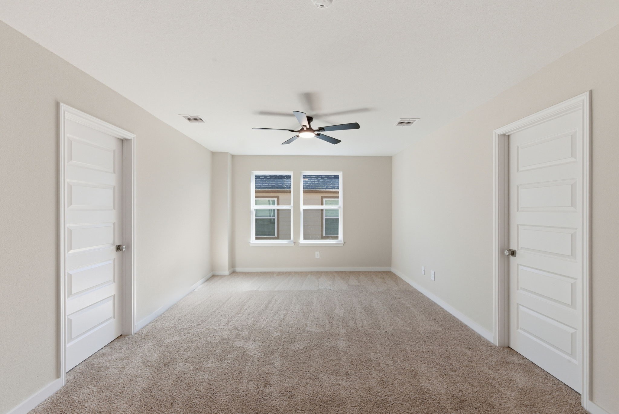 2443 Inlet Court Fresno, TX 77545 - Photo 36 of 50 a view of a livingroom with a ceiling fan and window
