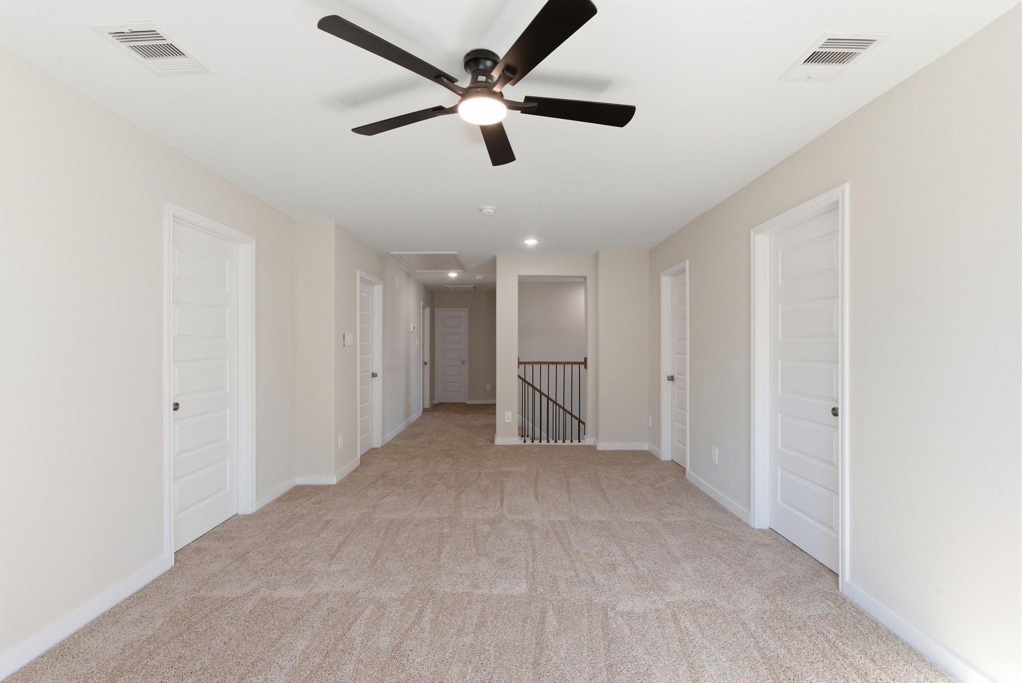 2443 Inlet Court Fresno, TX 77545 - Photo 37 of 50 a view of an empty room and a ceiling fan