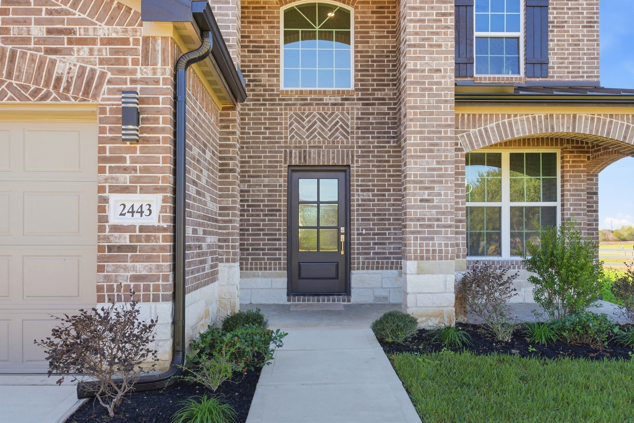 2443 Inlet Court Fresno, TX 77545 - Photo 4 of 50 a front view of a house having yard