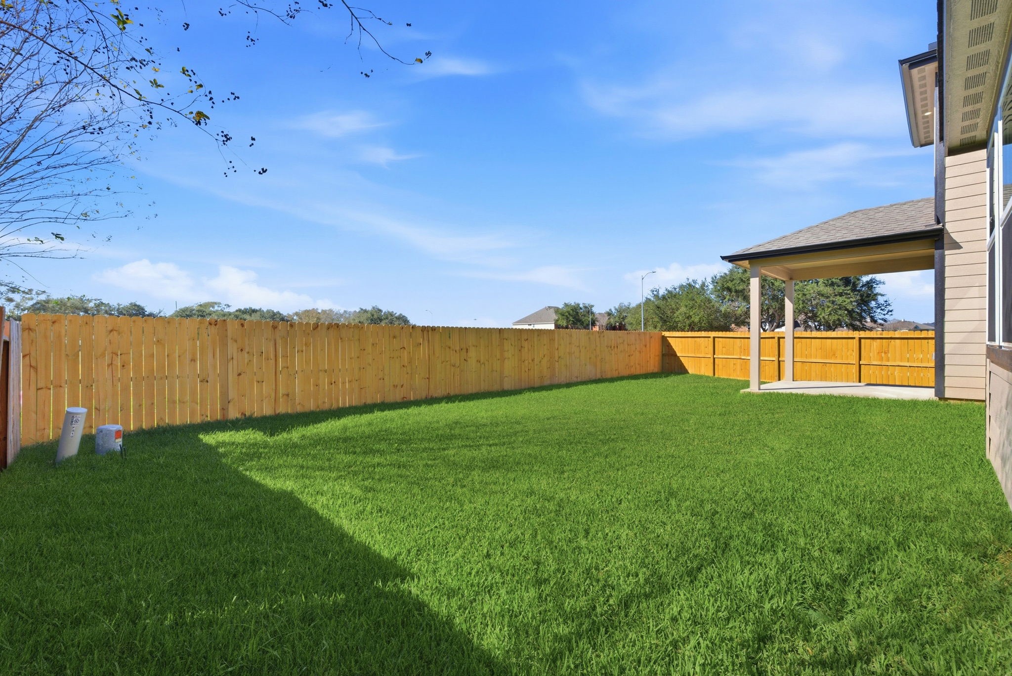 2443 Inlet Court Fresno, TX 77545 - Photo 49 of 50 a view of a yard with a house in the background