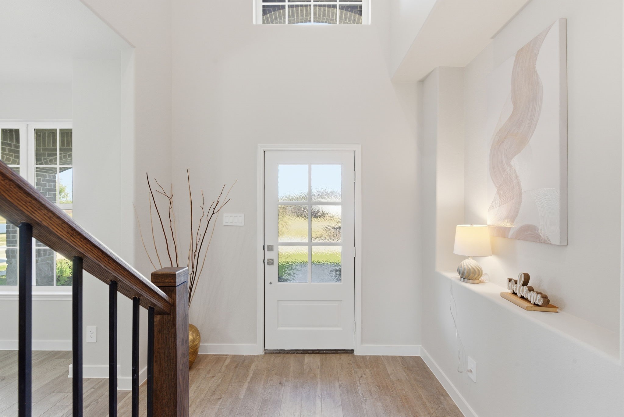 2443 Inlet Court Fresno, TX 77545 - Photo 5 of 50 a view of entryway with wooden floor