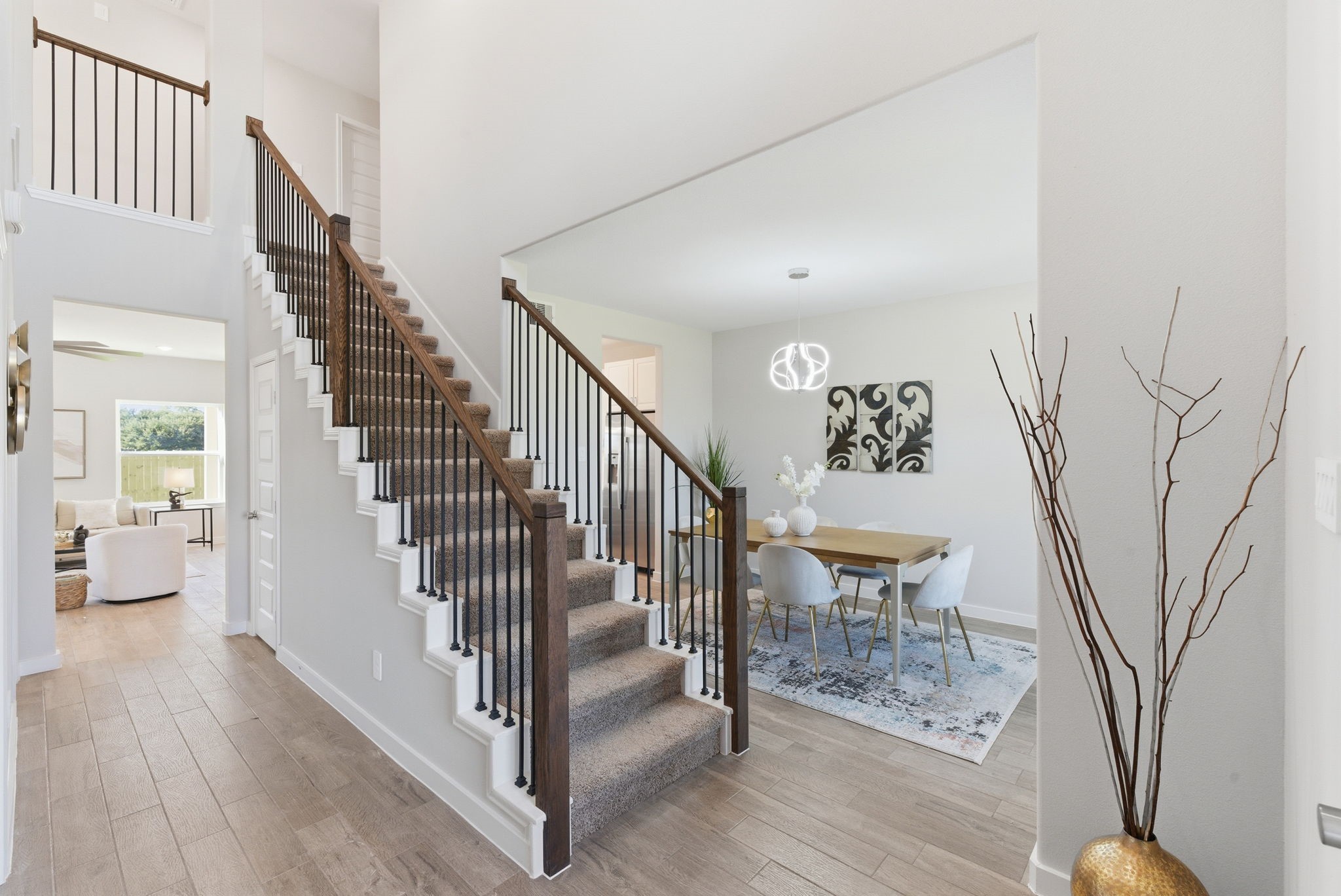 2443 Inlet Court Fresno, TX 77545 - Photo 6 of 50 a view of a hallway with staircase